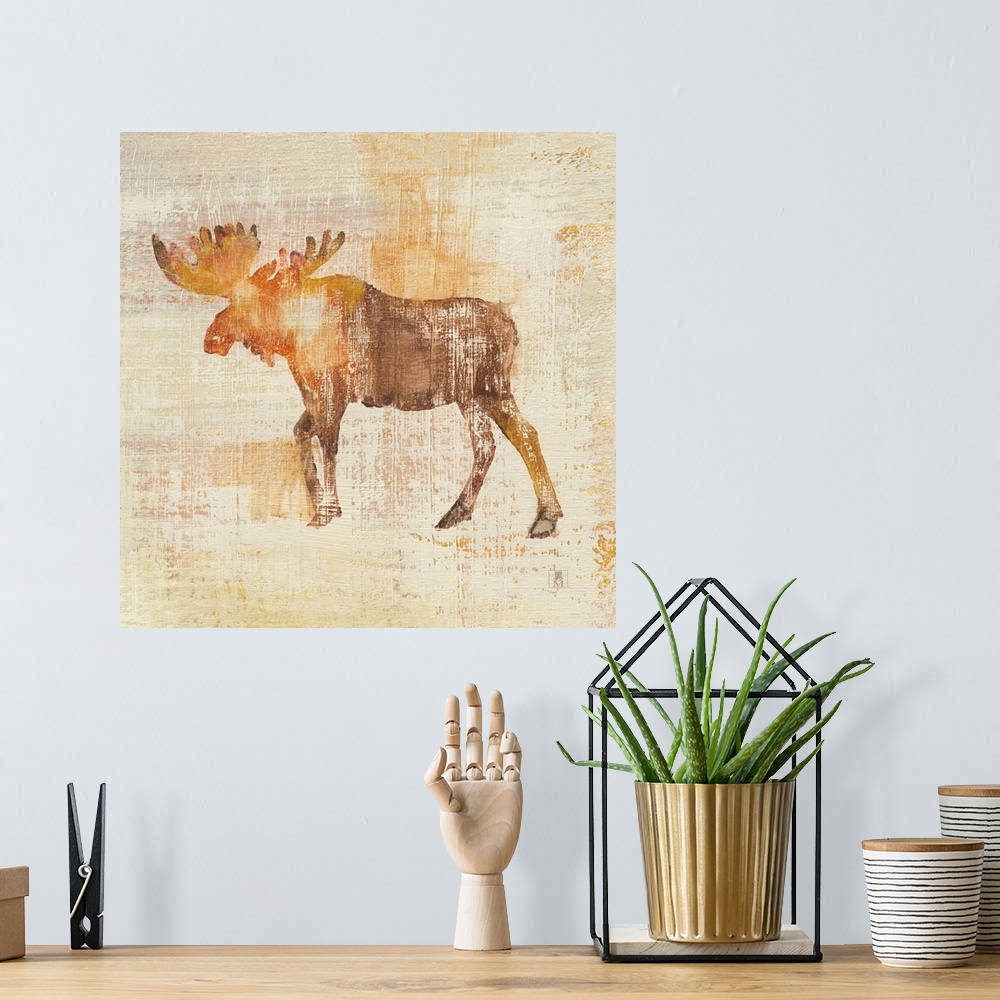 A bohemian room featuring Large square painting of a moose in textured brush strokes in orange, brown and gold.