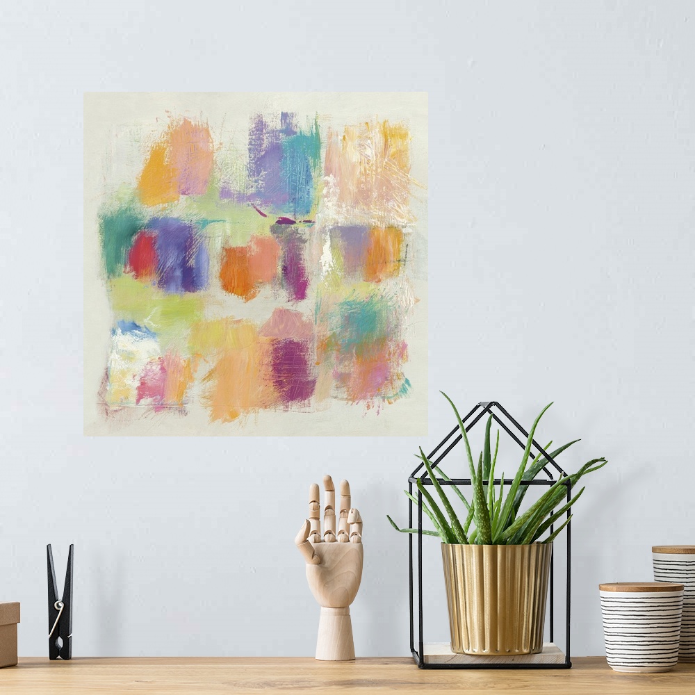 A bohemian room featuring Square contemporary abstract painting of multicolored square swatches on a white background.