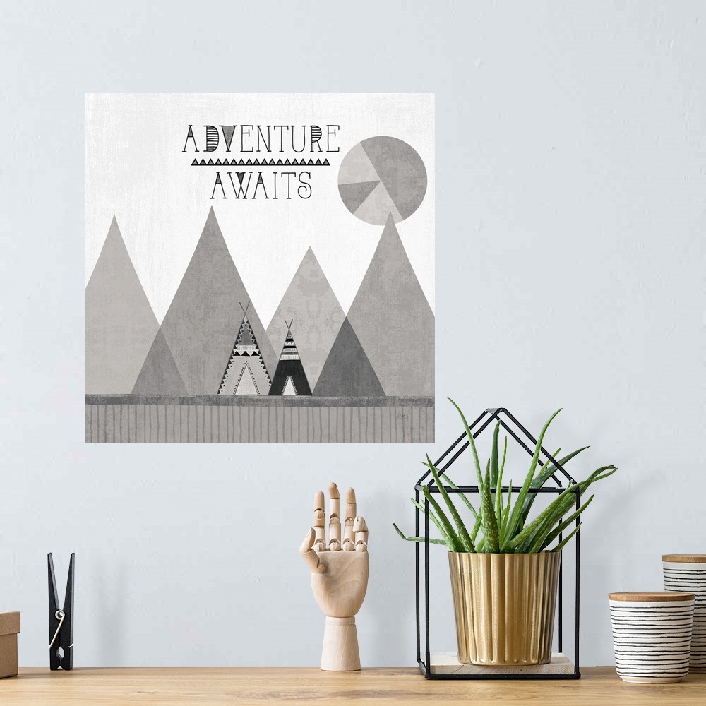 A bohemian room featuring A square decorative design of tents along mountains with the text 'Adventure Awaits', all in grey...