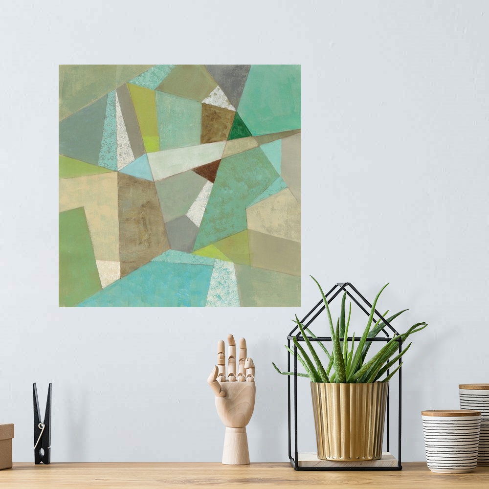 A bohemian room featuring Contemporary artwork with a retro mid-century vibe of a geometric shapes in various colors.