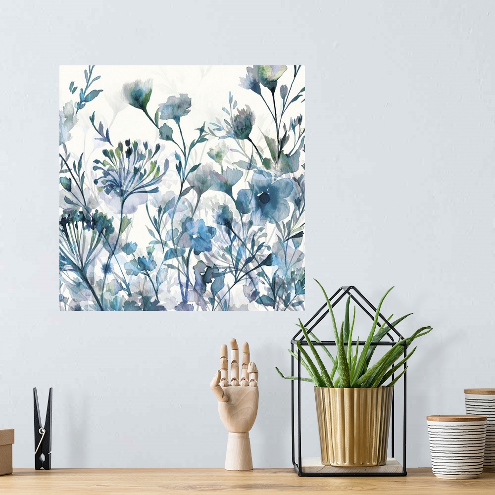 A bohemian room featuring Image of several watercolor flowers in cool blue and green tones.