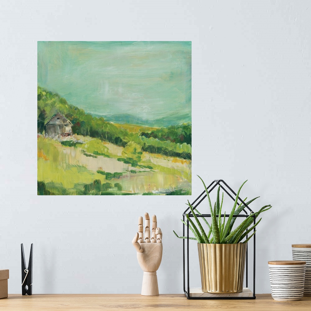 A bohemian room featuring Contemporary painting of a small house on a hillside covered in green trees and grass.