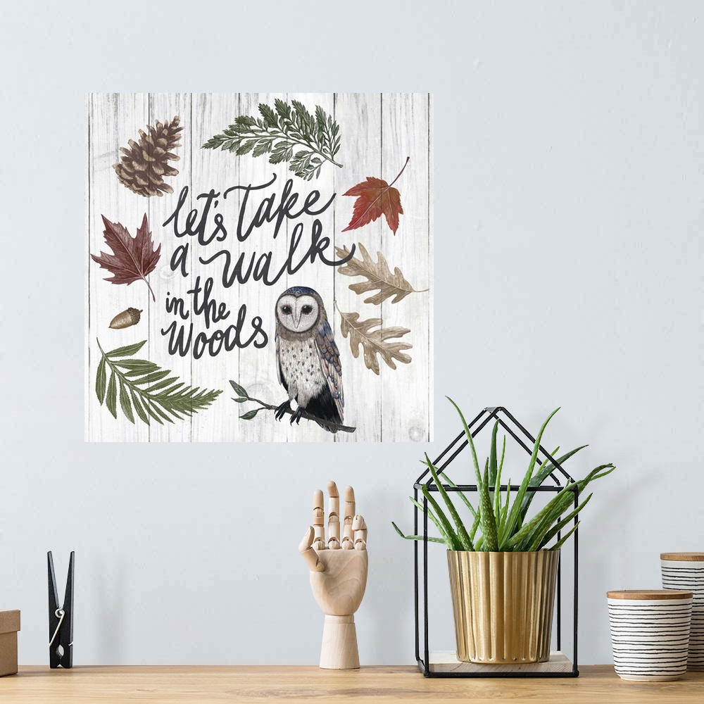 A bohemian room featuring Handlettered text with painted leaves and a barn owl.