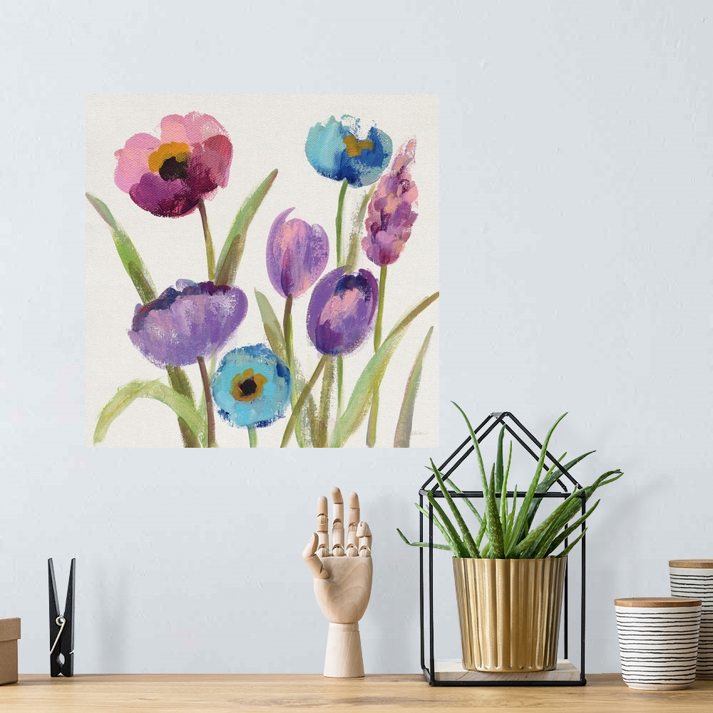 A bohemian room featuring Square watercolor painting of purple, blue, and pink flowers on a white background.