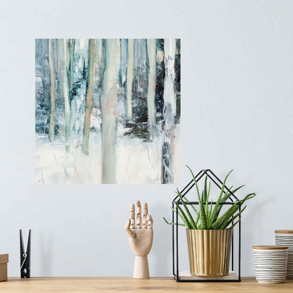 A bohemian room featuring Square abstract painting of birch trees in the woods covered in snow with cool tones.