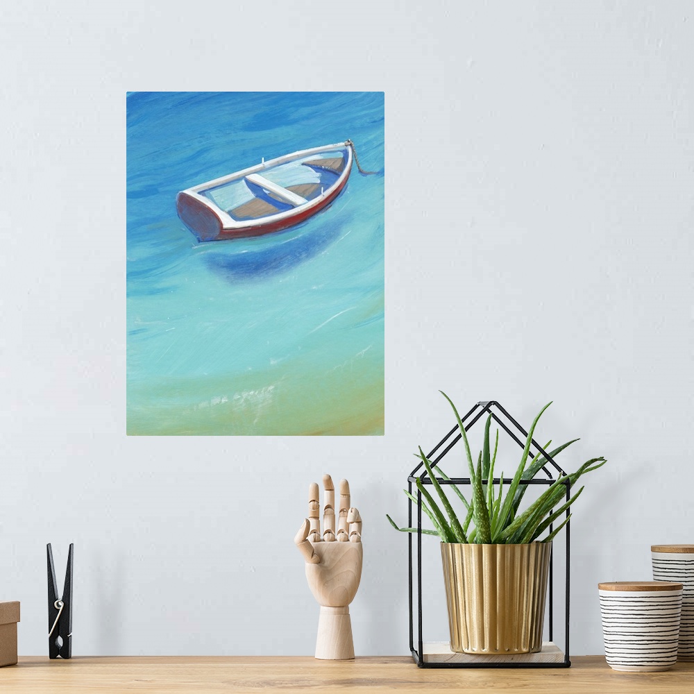 A bohemian room featuring A quaint, little white and red boat anchored in brilliant, calm blue water.