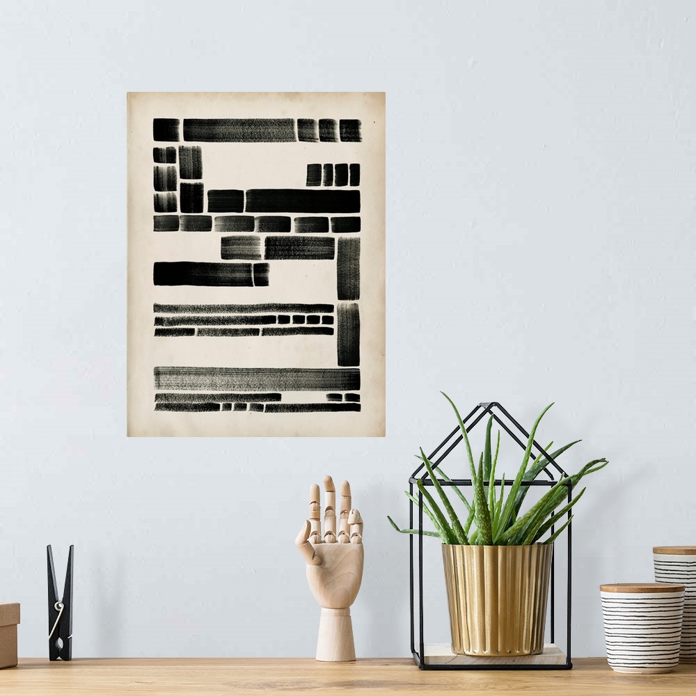 A bohemian room featuring Abstract artwork of a pattern of black rectangles of varying sizes.