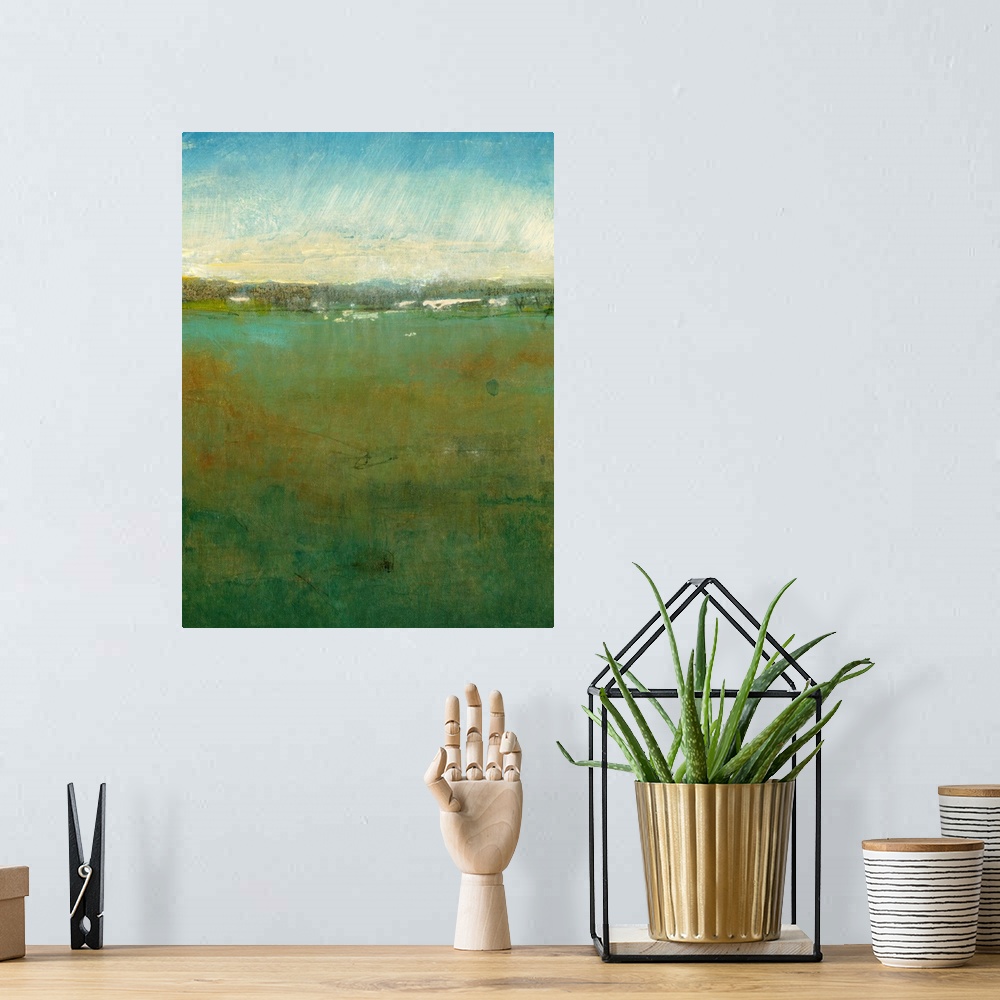 A bohemian room featuring Abstract artwork of a massive field with a cloudy sky painted above it.