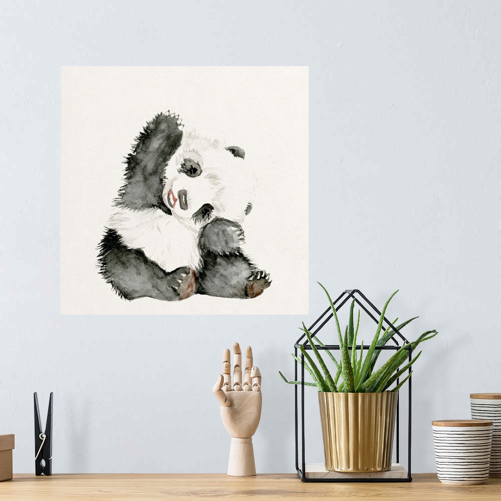 A bohemian room featuring Watercolor artwork of a cute baby panda waving.