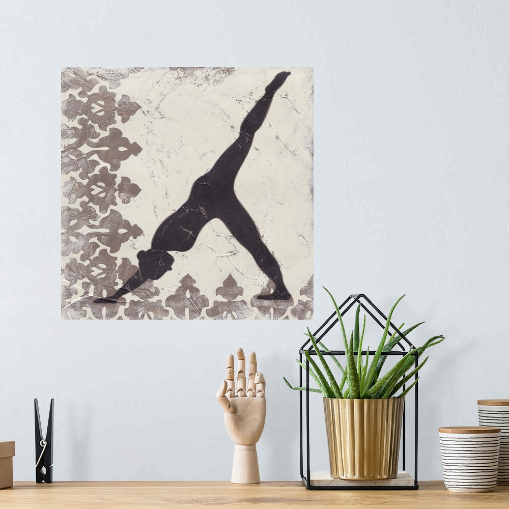 A bohemian room featuring Decorative print of a yoga pose.