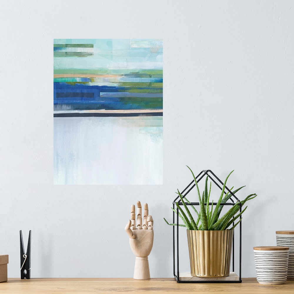 A bohemian room featuring Abstract painting in blue, green, and nude hues with layered lines at the top.
