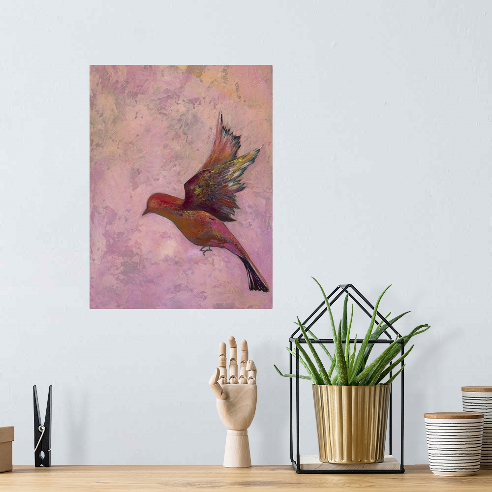 A bohemian room featuring Colorful contemporary painting of a bird in flight against a pink background.