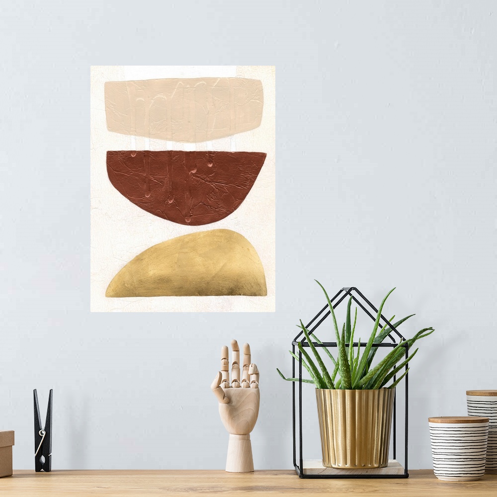A bohemian room featuring A contemporary, mid-century modern painting of three organic shapes resembling stacked up bowls