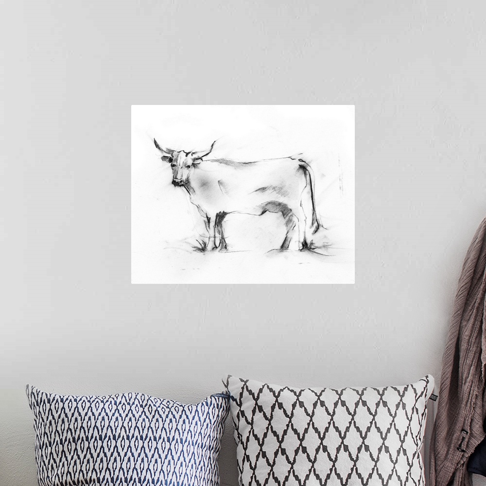 A bohemian room featuring Charcoal artwork of a bovine in gray tones against a white background.