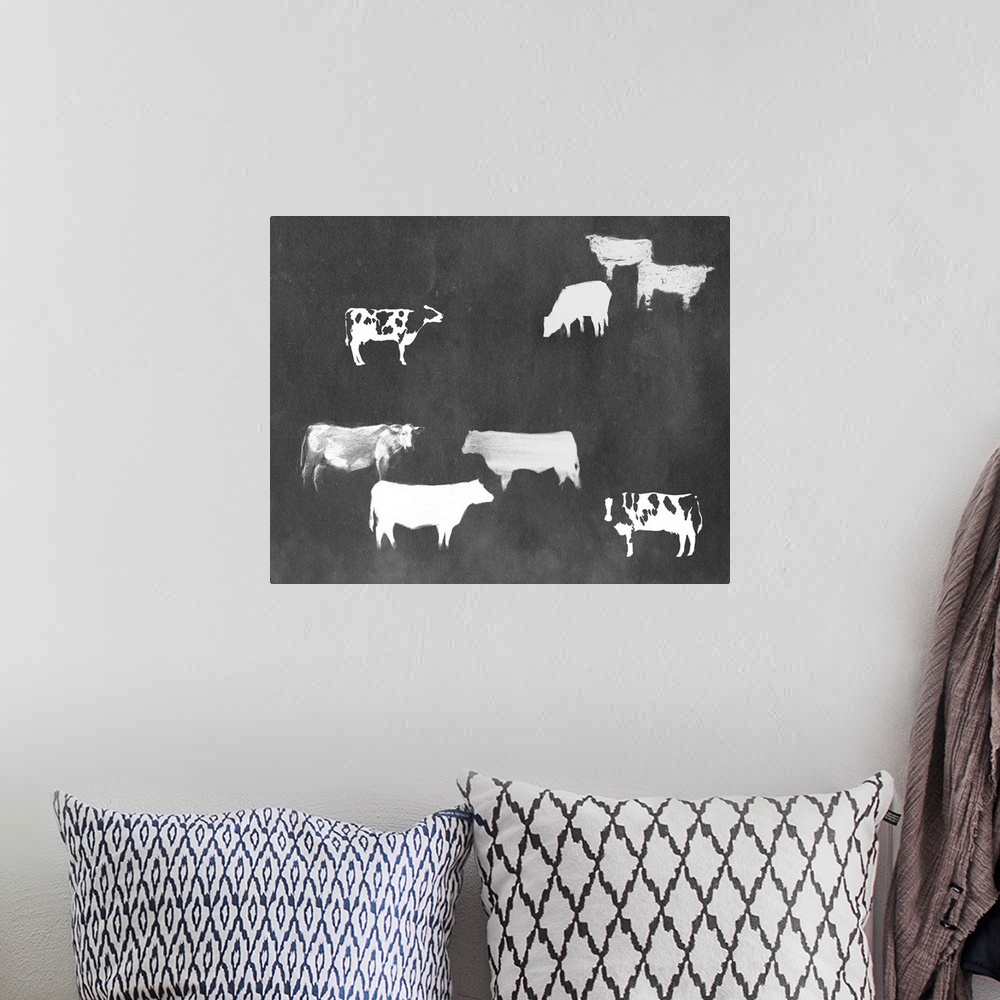 A bohemian room featuring Cow Collection II