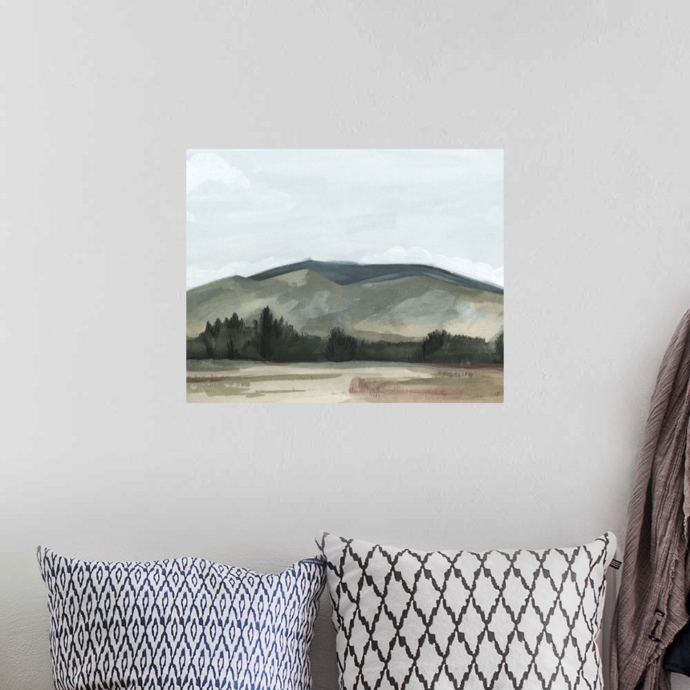 A bohemian room featuring Contemporary painting of a country field with mountains in the background, all in a dull appearance.