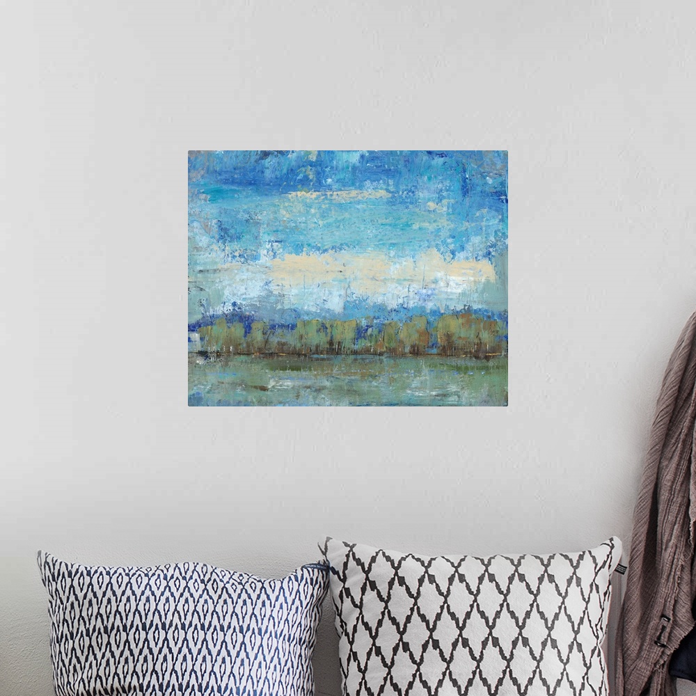A bohemian room featuring Semi-abstract painting of a grove of trees under a blue sky.