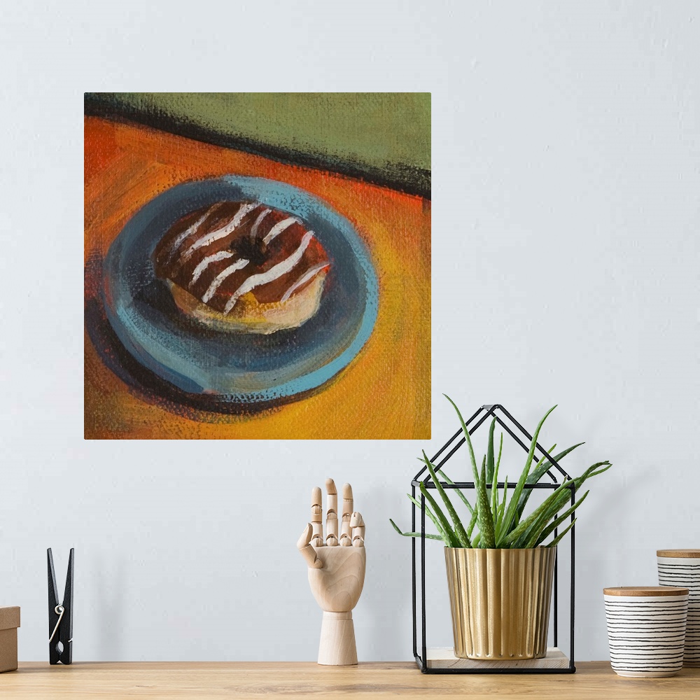 A bohemian room featuring Contemporary painting of a chocolate frosted donut on a blue plate.