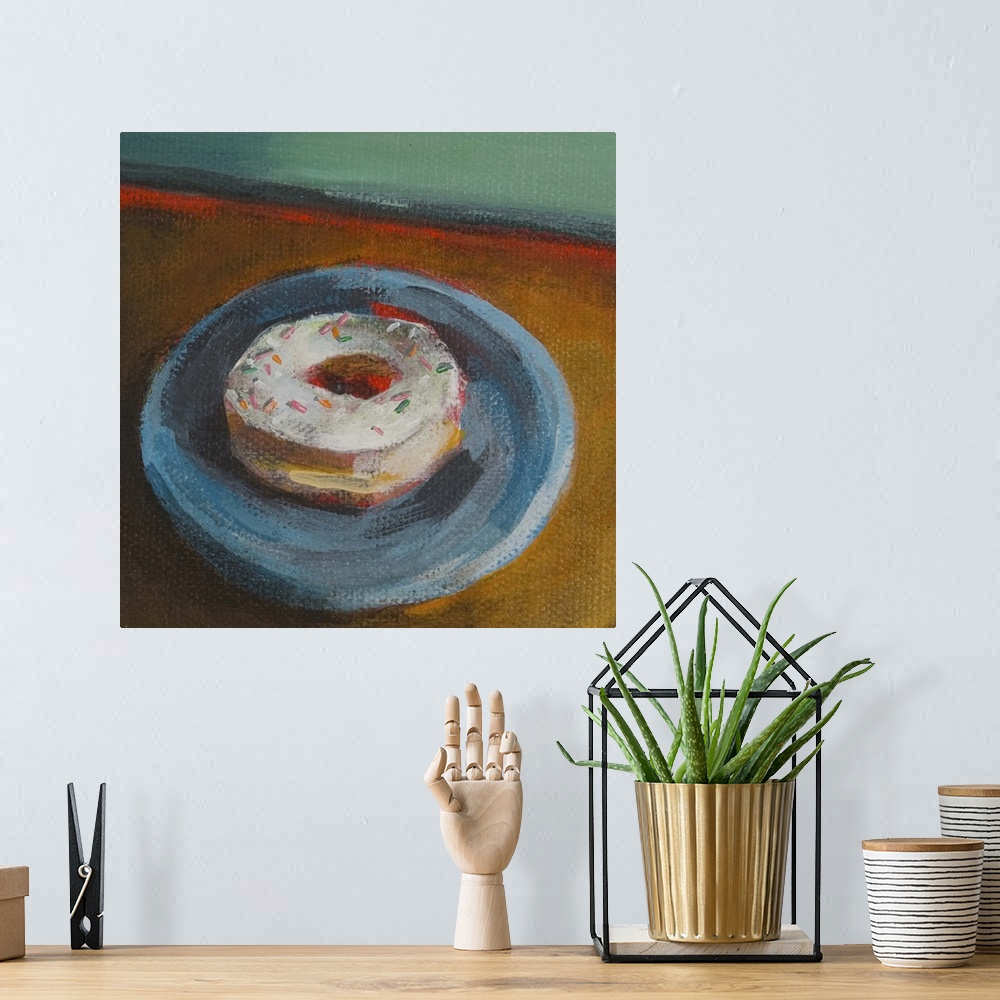 A bohemian room featuring Contemporary painting of a vanilla frosted donut on a blue plate.