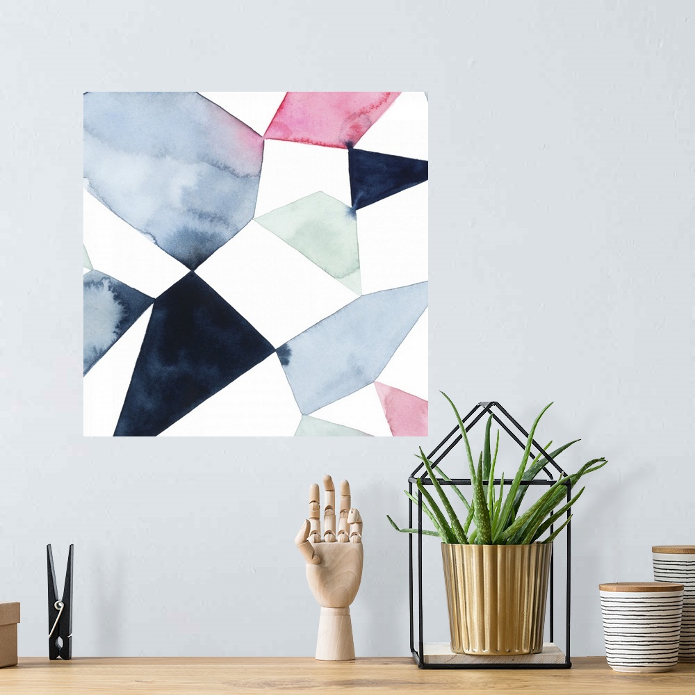 A bohemian room featuring Modern watercolor painting of blended colors in geometric shapes connecting on a white background.