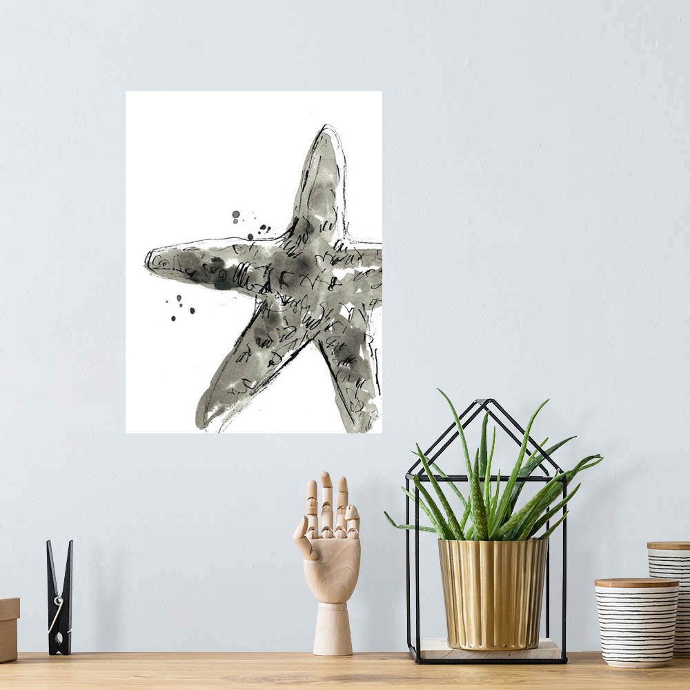 A bohemian room featuring Black and white watercolor painting of a starfish.