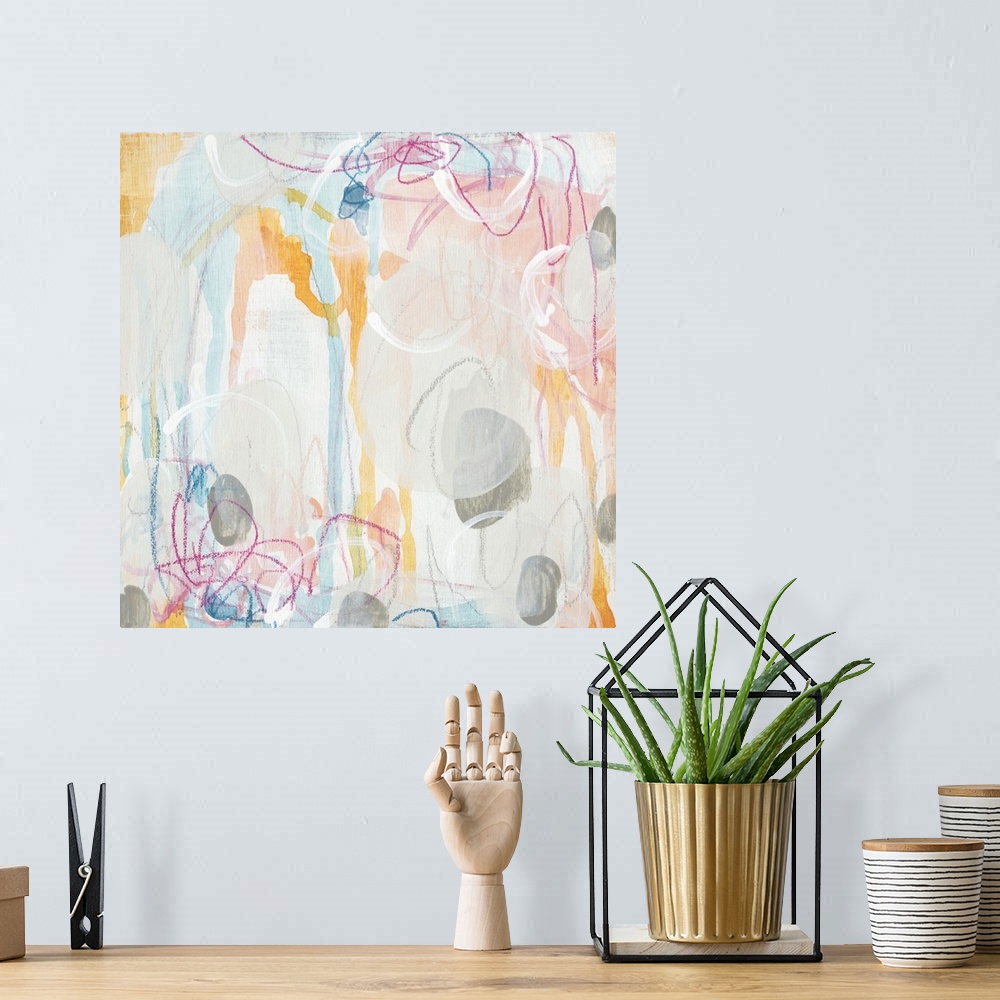 A bohemian room featuring Square abstract painting in light pastel colors with drips of the overlapping paint and colored s...