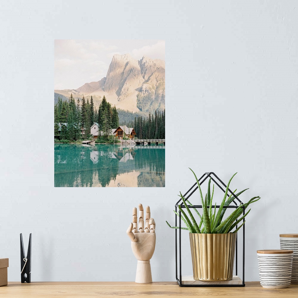 A bohemian room featuring Photograph of Emerald Lake Lodge and surrounding trees reflected in Moraine Lake, Banff, Canada.