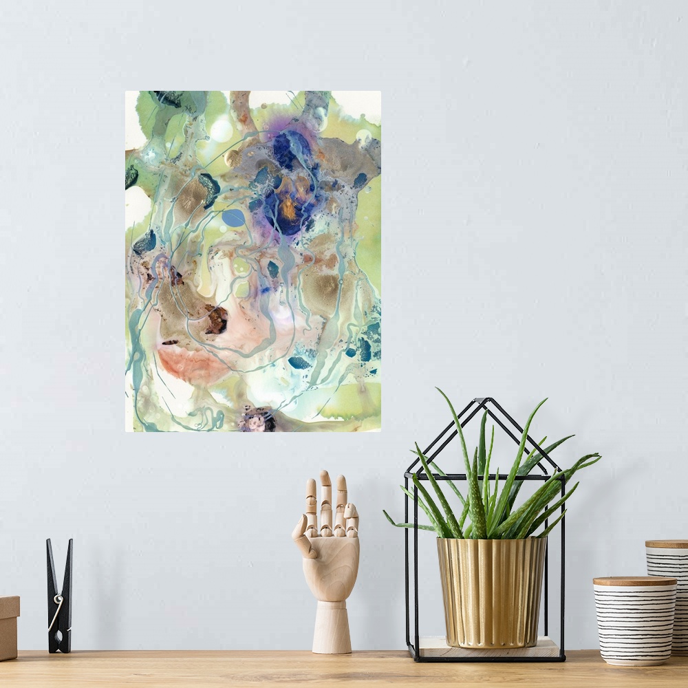 A bohemian room featuring Vertical abstract artwork of varies colors in a messy swirls with fine drips of paint.