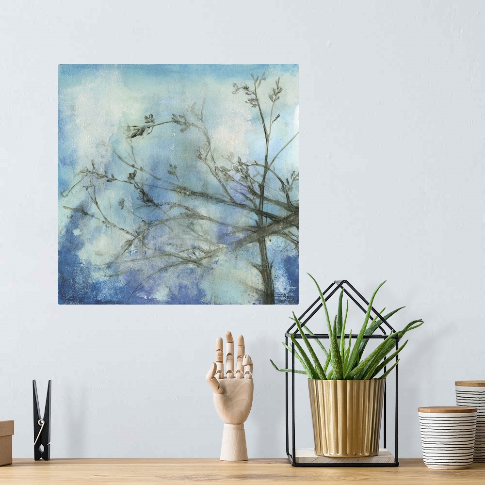A bohemian room featuring Contemporary watercolor painting of tree branches against a blue moonlit sky.