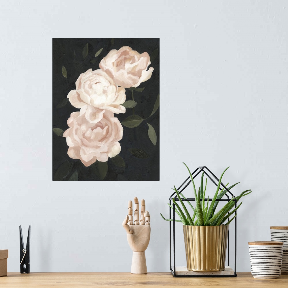A bohemian room featuring Vertical painting of blush and white blooming flowers against dark green leaves.
