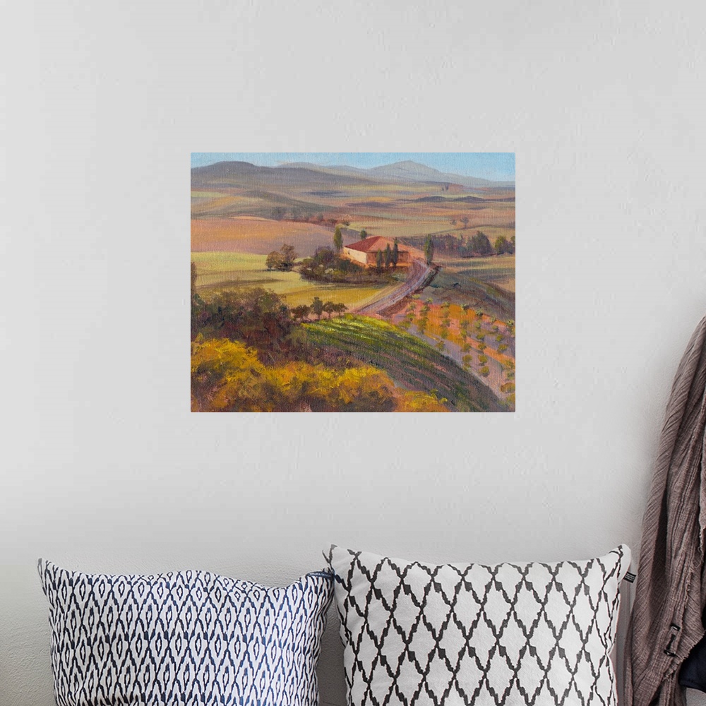 A bohemian room featuring A contemporary painting of a Tuscan landscape of rolling hills in warm muted tones.