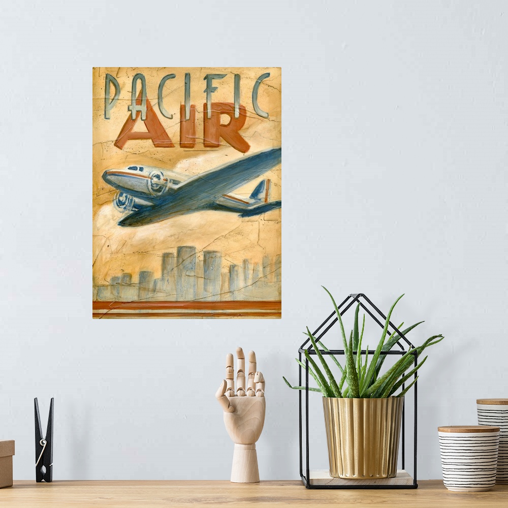 A bohemian room featuring Vertical artwork on a large wall hanging of a vintage advertisement for Pacific Air.  A large jet...