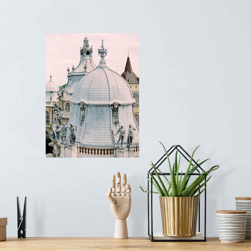 A bohemian room featuring A photograph showing the highly detailed architecture of a domed roof in Paris, France.