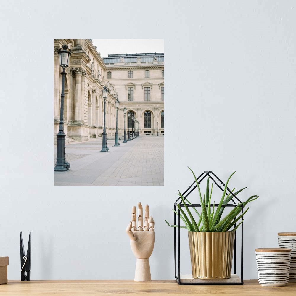 A bohemian room featuring Photograph of the elegant architecture of Paris.