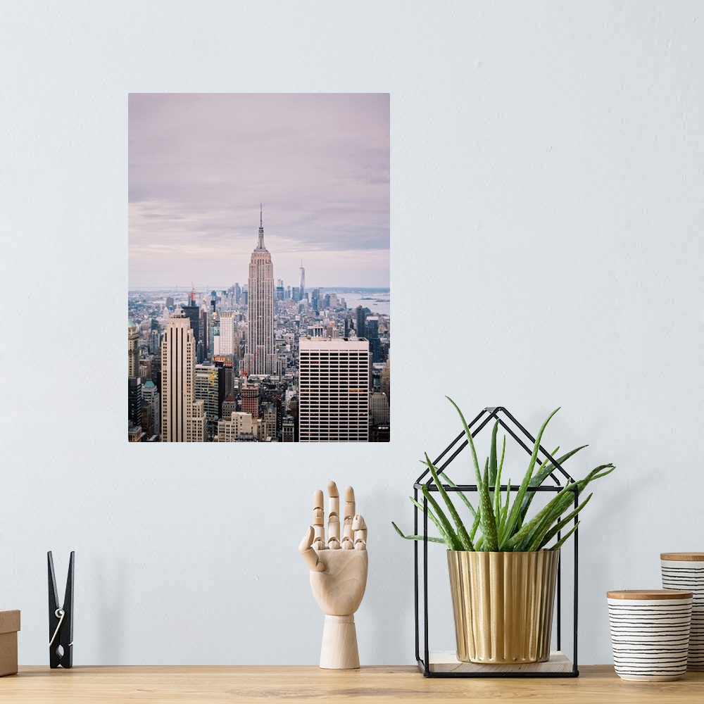 A bohemian room featuring Photograph of the Empire State Building and surrounding buildings, Manhattan, New York City.