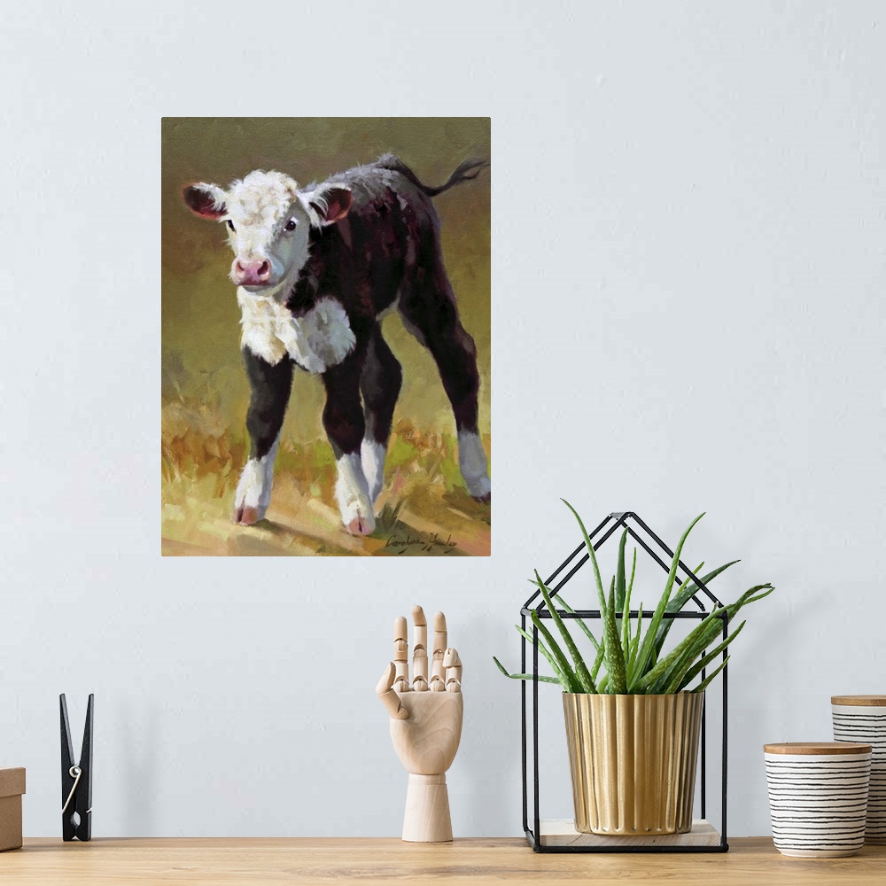 A bohemian room featuring Contemporary artwork of a young brown and white calf.