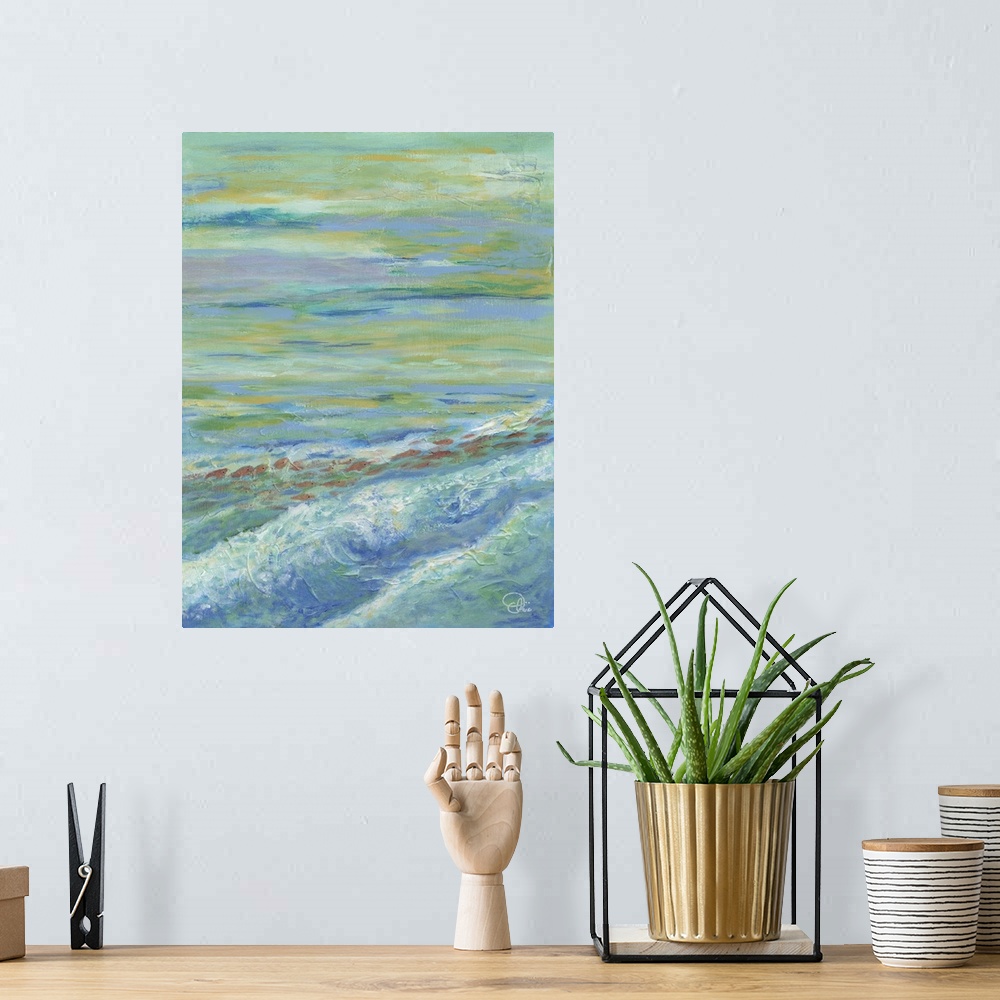 A bohemian room featuring Contemporary artwork of the ocean with shallow waves, under a cloudy sky.