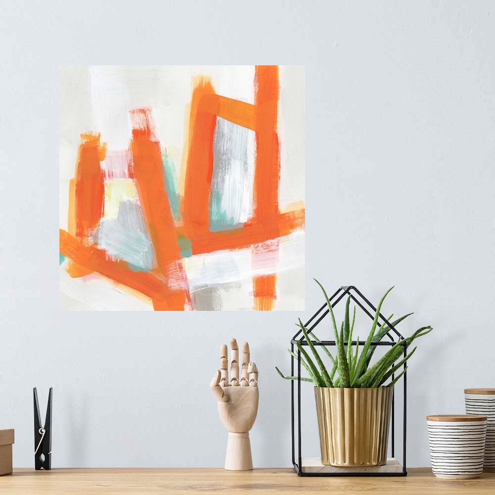 A bohemian room featuring Mid-century inspired abstract painting of broad orange strokes against a neutral background.