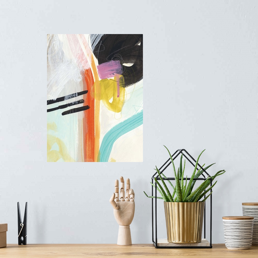 A bohemian room featuring Brightly colored abstract painting with orange, teal, and yellow.