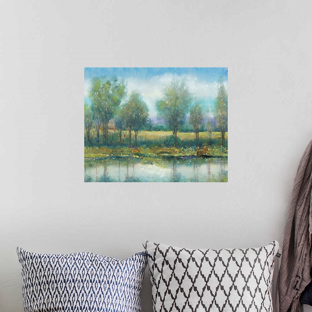 A bohemian room featuring River Reflection II