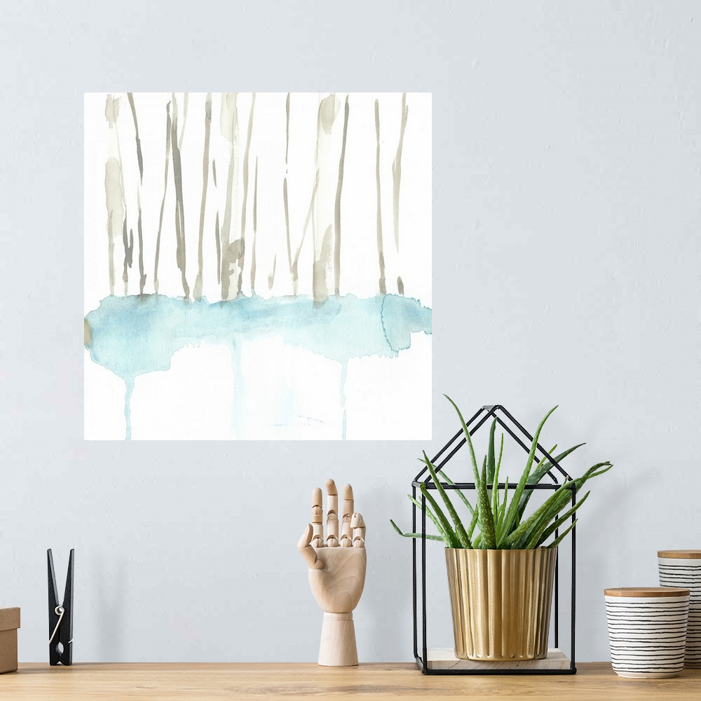 A bohemian room featuring Square watercolor painting of abstract tree trunks in brown with snow against a white background.