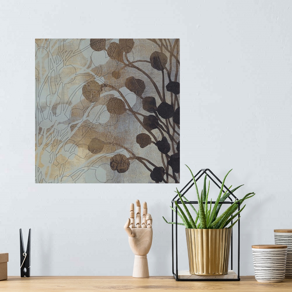 A bohemian room featuring Contemporary artwork of silhouetted flower buds against a faded background.