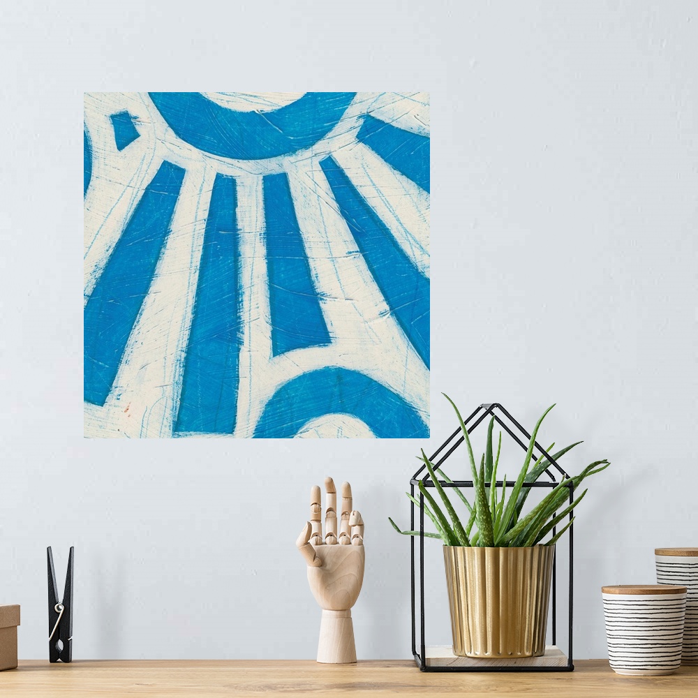 A bohemian room featuring Mid-century inspired painting of abstract shapes in vibrant colors.