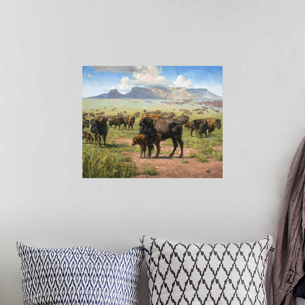 A bohemian room featuring Contemporary artwork of lively brush strokes that create a serene western landscape filled with r...