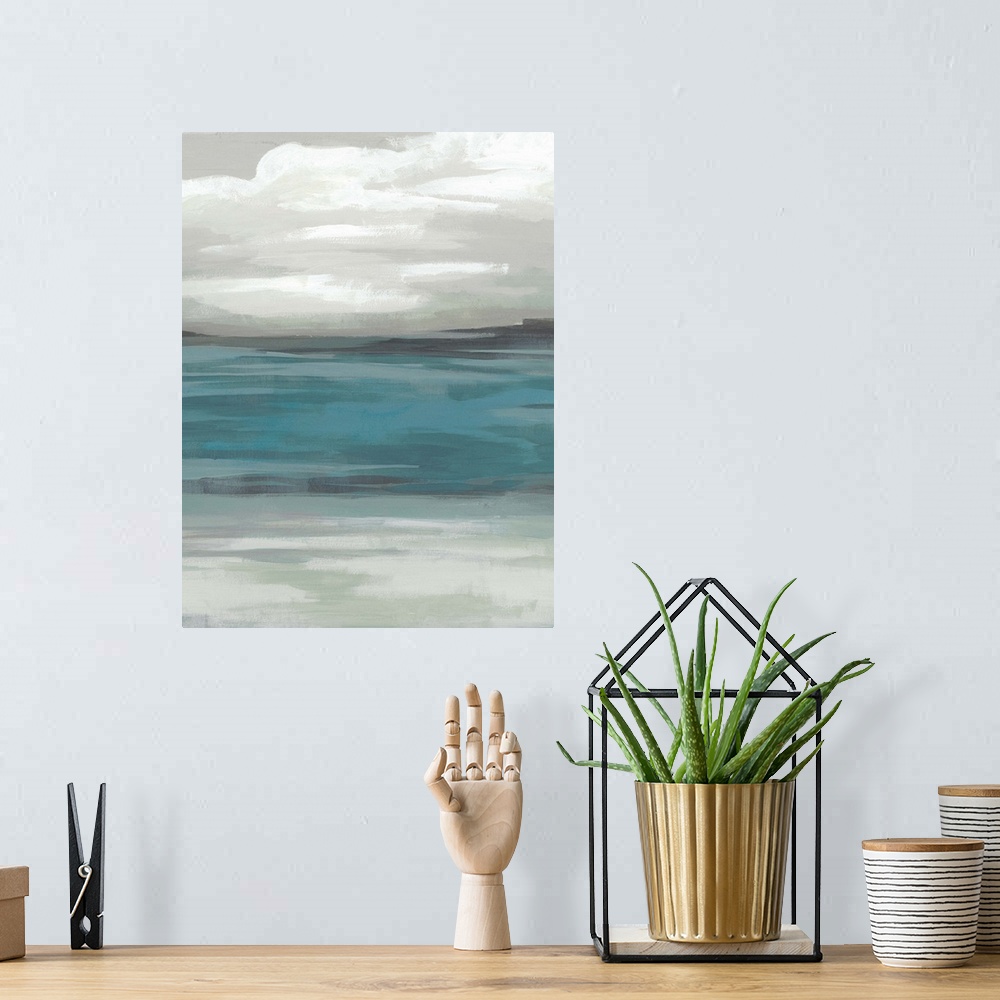 A bohemian room featuring A simple painting of a stormy, overcast sky above a tranquil sea.