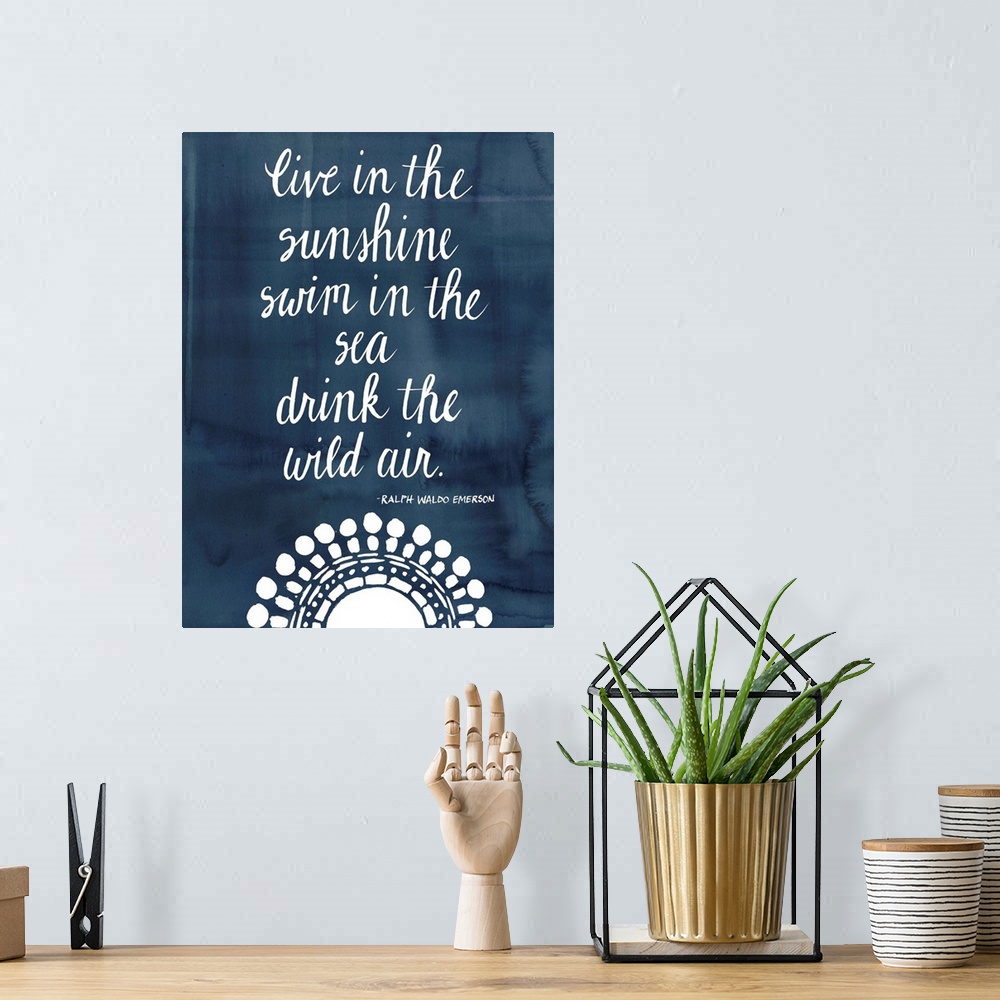A bohemian room featuring Handwritten quote in white over a deep navy blue background.