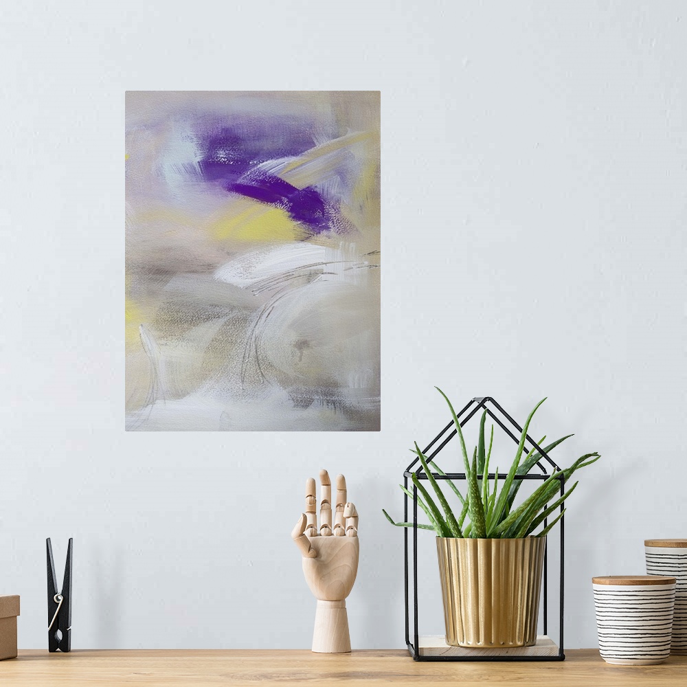 A bohemian room featuring Contemporary abstract painting in white and yellow with dark purple.