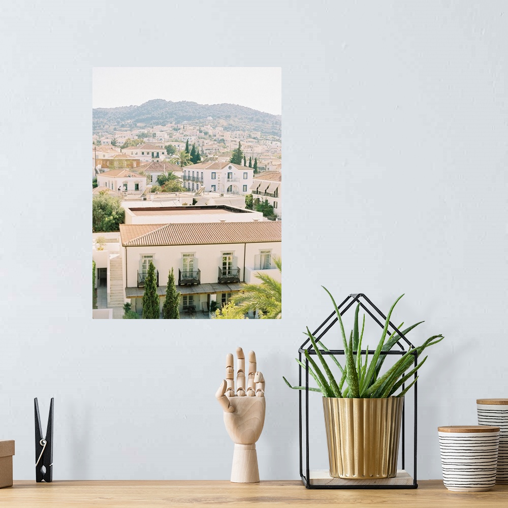 A bohemian room featuring Photograph of building roofs in Spetses, Greece.