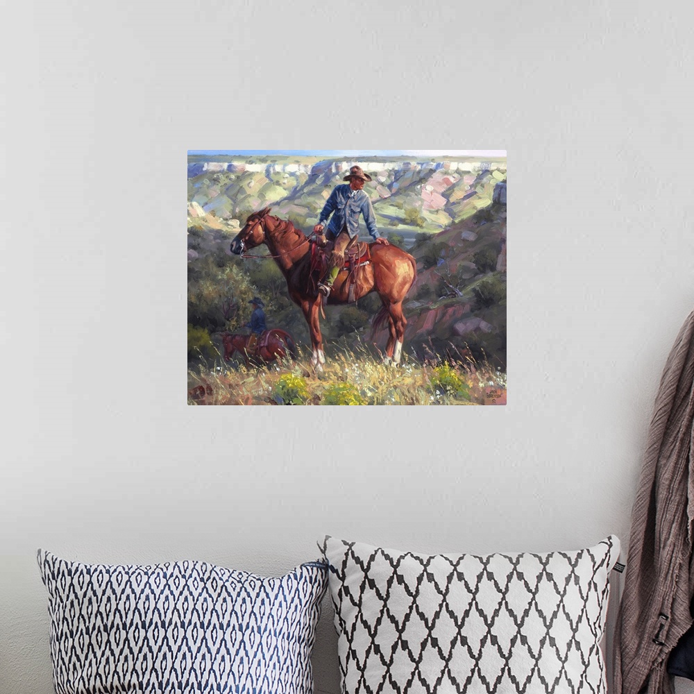 A bohemian room featuring Contemporary painting of a cowboy on a chestnut horse overlooking a western valley landscape.