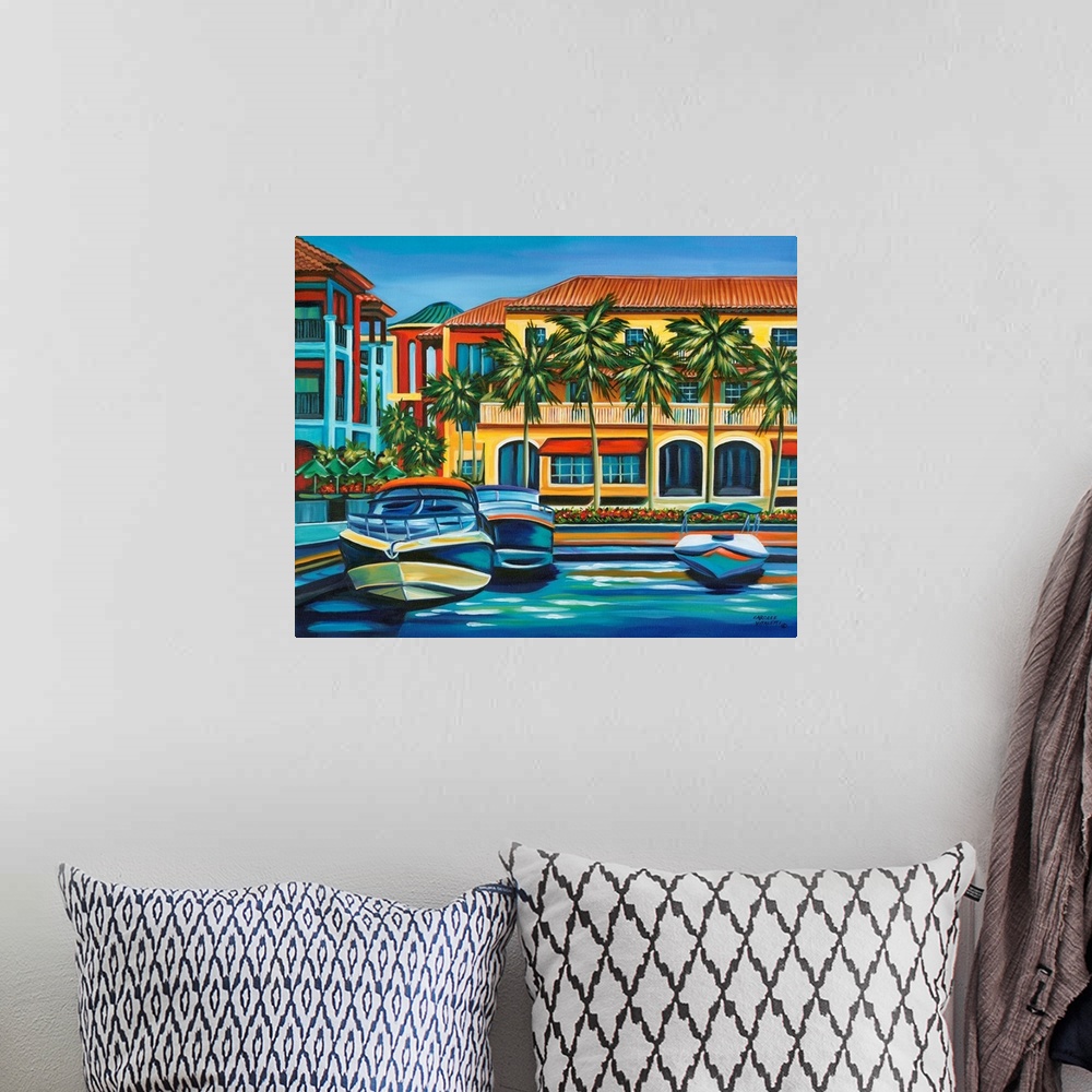 A bohemian room featuring Contemporary artwork of a riverside resort with several boats at the dock.